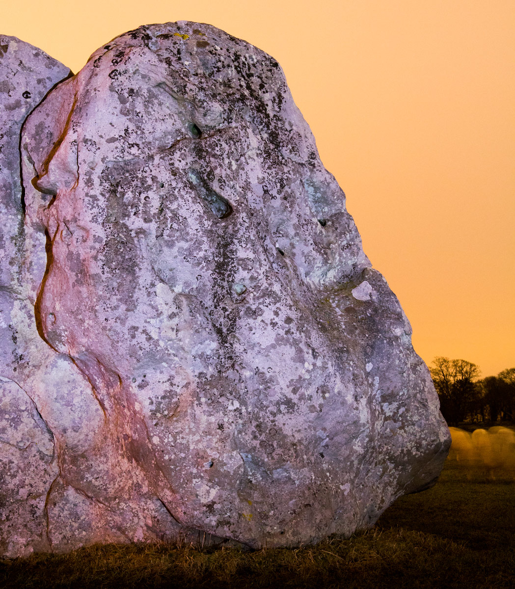 Night photograph of gigantic stone woman at Avebury